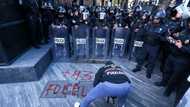 11 police hurt at Mexico protest over missing students