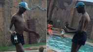 Man's lit moves while clutching booze at poolside have SA howling, "If happiness was a person"