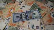 Argentina devalues peso after shock primary election result