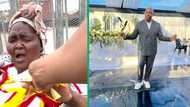 Gogo overcome with emotions as she receives money from BI Phakathi while selling chips on the street