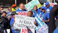 DA pickets outside ministers' luxury mansions, says they live like rockstars while millions suffer in poverty