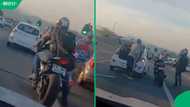 Joburg biker backs down after driver pulls axe in road rage standoff video