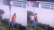 Man on SA road steals yield sign and has Mzansi up in arms over security footage, "At this rate we will have no country left"