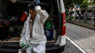 'In a sauna': Hong Kong's labourers swelter as temperatures rise
