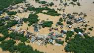 What is causing record floods and heatwaves in China?