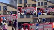 Haibo: Video shows community trying to fill up fire truck with buckets to put out fire on burning building