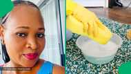 "Ulanda iflu": Makoti washing carpet in pouring rain, Netizens joke about getting a cold