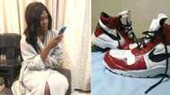 Woman can't afford to buy her man Air Jordan's, paints his work boots instead