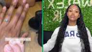 Woman flaunts man that proposed to her after 3 weeks, Mzansi envious: "Team interracial"