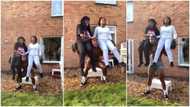 Young man carries 2 sisters on top of very heavy weight bar in viral video