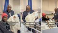 President Cyril Ramaphosa shares heart-warming moment with new mom in hospital, holds 1 day old baby