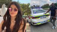 Police protect stranded female motorist, help change her tyre in dangerous spot