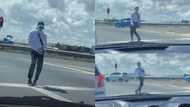Only in SA: Man gets all the vibes going at intersection as he dances in formal clothes