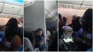 Woman caught on video sewing clothes inside an aeroplane while lady looks on, many react