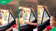 “That’s dangerous:” Child reaches out car window to hand money to beggar, leaves TikTok divided