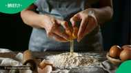 A woman shared an easy Romany Creams recipe, showing how to combine the ingredients into a rich biscuit dough