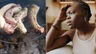 Mzansi grossed out as lady braais snake in 3 parts over flame, Twitter video leaves SA with questions