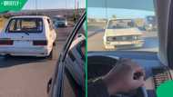 "Only in South African": Mzansi in mixed emotions after man overtakes car in reverse on busy road