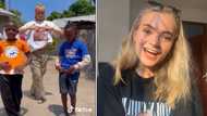 Danish woman in Tanzania and her 2 young friends show cultural appreciation through traditional dances