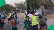 "The Spring videos we want to see": Water splashers spare delivery driver during street water fights