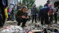 Makeshift wifi spot reconnects shattered Ukraine city