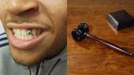 Lawyer quits after defendant uses gold tooth as payment for legal fees