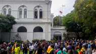 Sri Lanka leader flees as protesters storm home