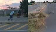 Sweeping the way to greatness: Man cleans garbage in street by himself