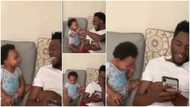 Sweet moment as father and baby fist bump in viral home video