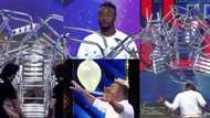 Hayford Okine: Acrobat sets world record as he balances 16 chairs on his chin in 10 seconds