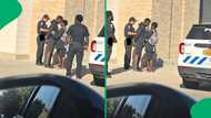 "May a love like this find me": Girlfriend stays by boyfriend's side as police officers handcuff him