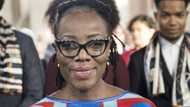 Zimbabwe issues arrest warrant for top author