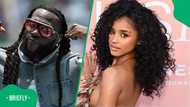 Tyla poses for a photo with Nigerian star Bura Boy after World Cup opening ceremony