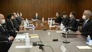 Bank of Japan leaves policy unchanged, yen weakens