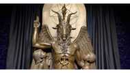 Satanists vow to cast spell on whoever burned down their house