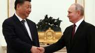 Xi calls Russia ties priority on Moscow trip