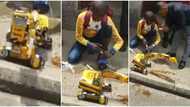 Talented teenager builds water powered toy Caterpillar truck