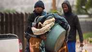 Group of KZN flood victims spend the night on the streets after being evicted from illegally occupied building