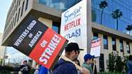Striking Hollywood writers decry the Uber-ization of their trade