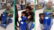 Little boy catches lift on elderly lady's mobility scooter in TikTok video, sweet moment tugs at SA's hearts