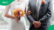 Philippine couple gets married in hip-deep floodwaters after refusing to postpone wedding
