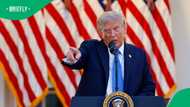 Trump spotted with darker hair colour after stepping off Air Force One in New Jersey