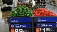 Walmart cuts profit outlook as inflation bites shoppers