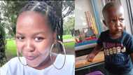 Young boy unmoved by Spur's celebratory song, gives them the death look