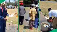 "I'm in tears watching this human": SA reacts to selfless gent cooking for hustling men in streets