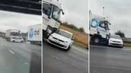 Truck dragging polo on highway leaves netizens confused, Mzansi discusses whose fault it is: "We are not sure"