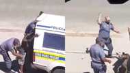 SA outraged after clip of police sjamboking locals is shared online