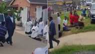 Footage of church members kneeling for pastor as he walks go viral