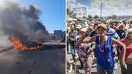 Nyalas, bricks and burning tires litter Diepsloot streets as residents revolt over high crime level