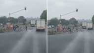 Man records people helping truck move fallen load off the road, not looting, fills hearts with hope for Mzansi